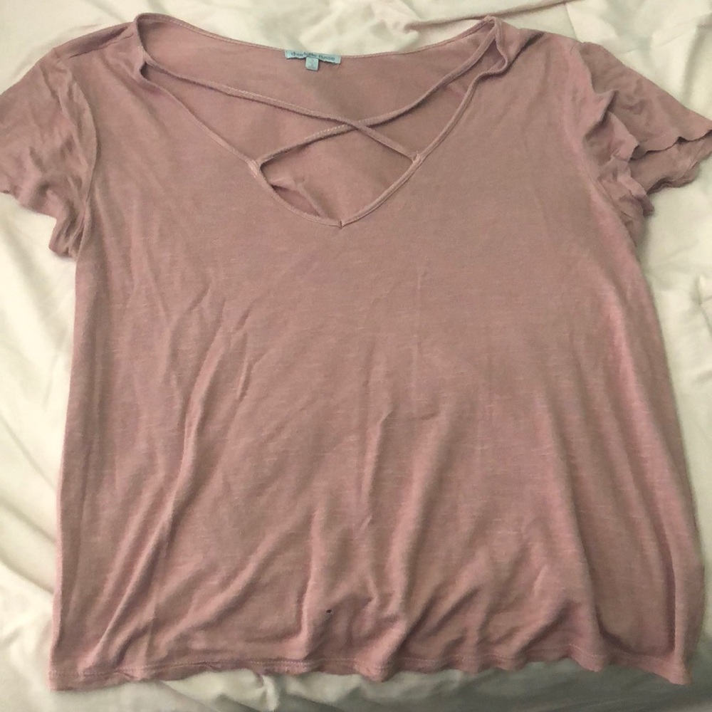 Cute pink T-shirt with crisscross design